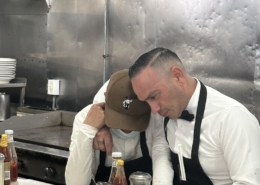 Workers at The Original Pantry comfort each other on the last day of restaurant operations after 100 years.