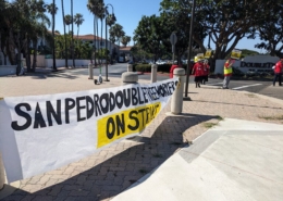 A white banner outside the DoubleTree San Pedro hotel