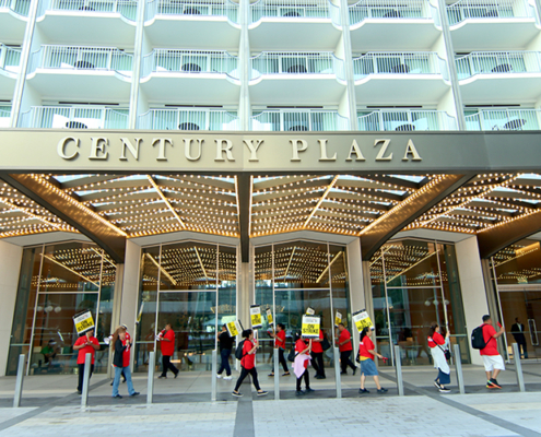 Hotel workers on strike picket in front of the Hyatt Century Plaza hotel