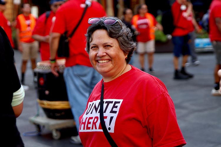 Elizabeth in red shirt smiles